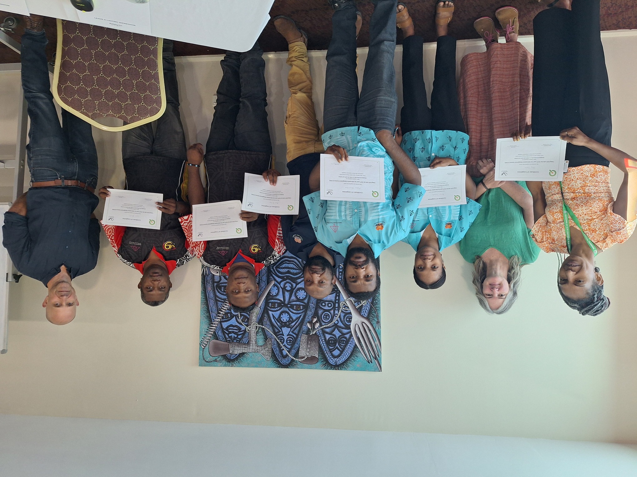People holding certificates